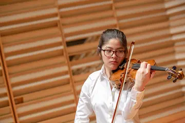 a student playing violin