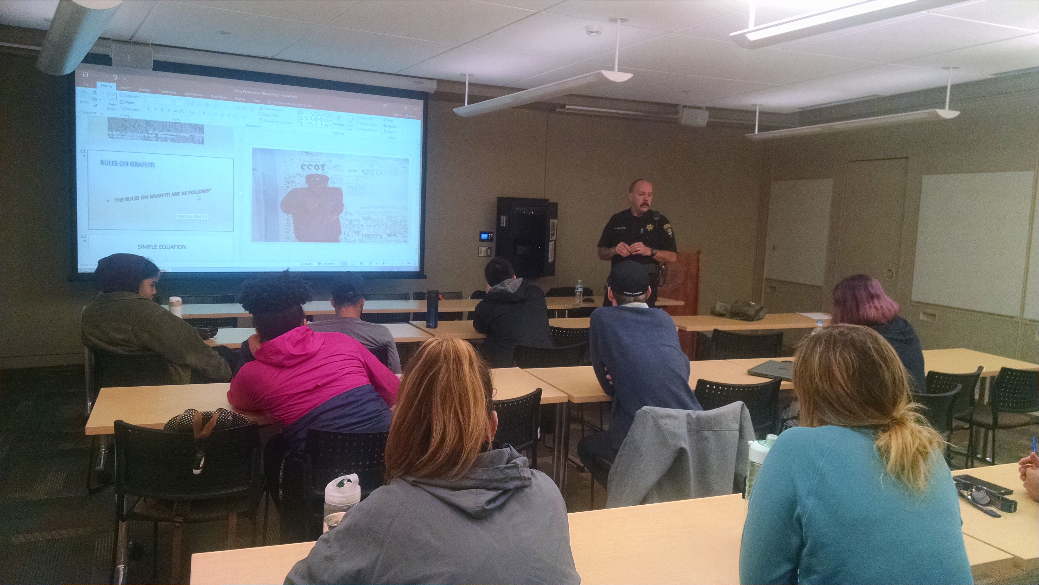 Correctional Officer Thomas Gilmore giving a talk to club members. Officer Gilmore is the Gang Intelligence Officer for the Chautauqua County Sheriff's Office - Correction's Division.