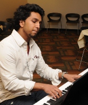 Musical performance by first-year student Masiur Abik