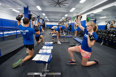 Students work out inside the performance center.