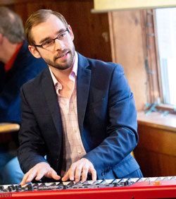 Dr. Nick Weiser playing the piano