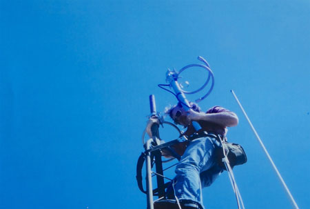 Dan Berggren installs aerial on building