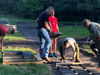 workers creating the remembrance garden