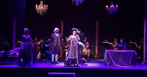 singers on stage in opera scene