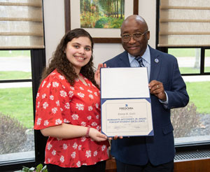 McConney award winner with SUNY Fredonia President Stephen H. Kolison Jr.