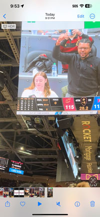 They're on the big screen: Josephine Swift and Robert Casiano III during the fourth quarter of the Cavs-76ers game.