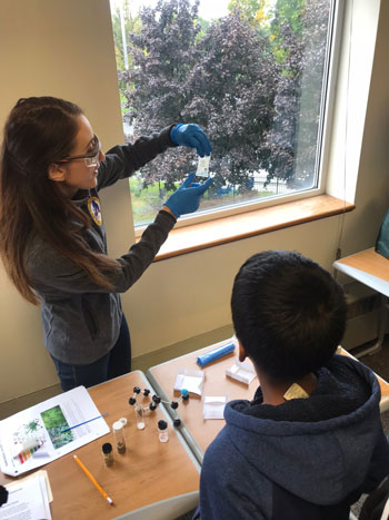 scientist with student