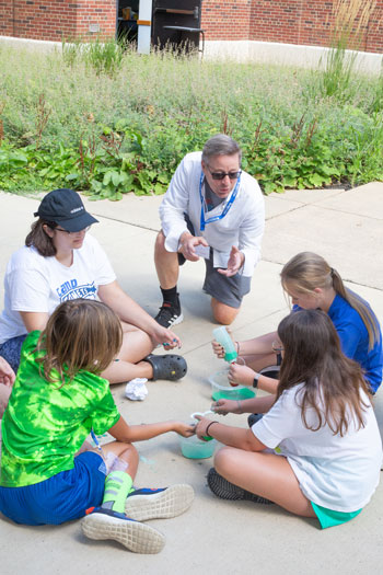 Dr. Keary Howard with young math campers