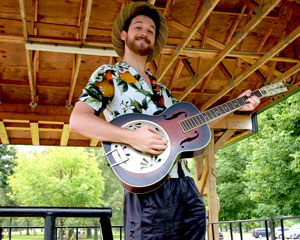 student playing on bandstand