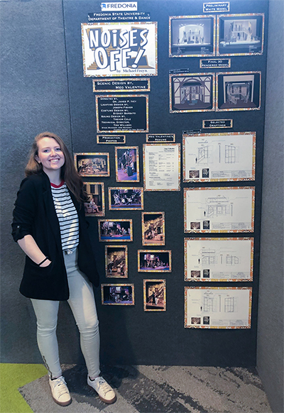 Meg Valentine, in front of her “Noises Off” scenic design in the Cover the Walls poster presentation. 