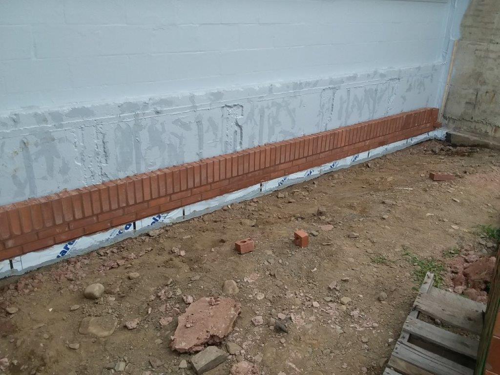 1st layer of brick
