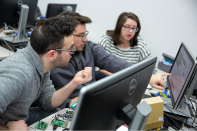 Pictures of students coding