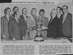 1972 - Amos Goodwine, captain of the Fredonia State basketball team, receives the outstanding senior athlete trophy