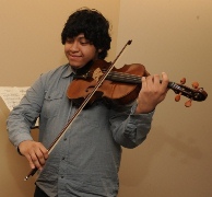 Musical performance by freshman Oscar Martinez on his viola.
