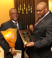 Amos Goodwine, Jr. '72 received Distinguished Alumni Award from EOP Director David White