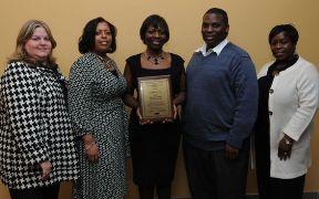 Audrey Pitts, center, with friends and family