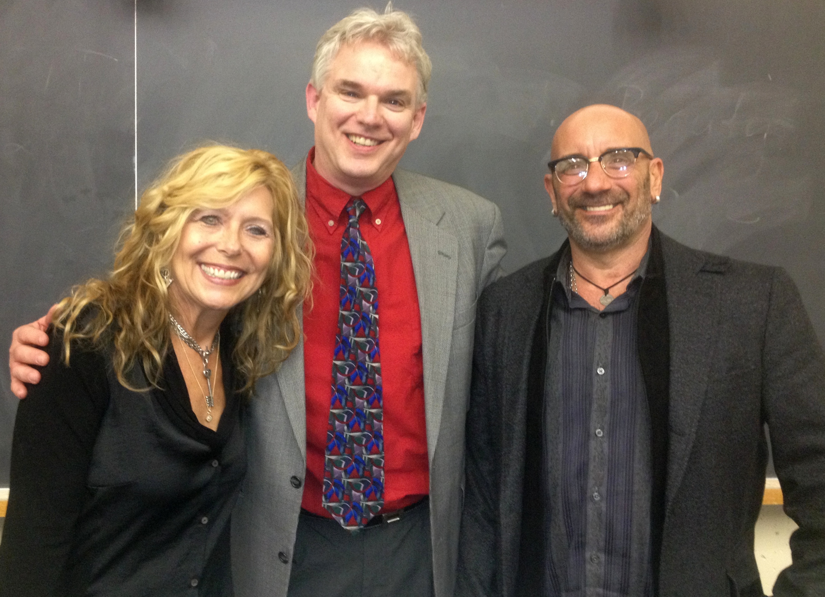 John and Linda Weiss with Armand Petri