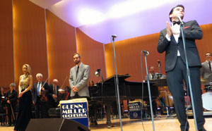 Dr. Nick Weiser (center) is flanked by vocalist Natalie Angst   and Nick Hilscher, director and vocalist, at the Glenn Miller   Orchestra’s concert at Kleinhans Music Hall in Buffalo.