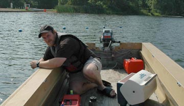 Damien Salerno sampling Cassadaga Lake in Chautauqua County