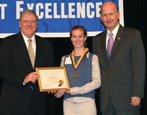 Image of Kelly Maloney receiving the Chancellor's Award