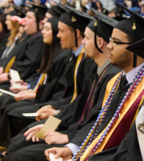 Graduates - in cap and gown at commencement