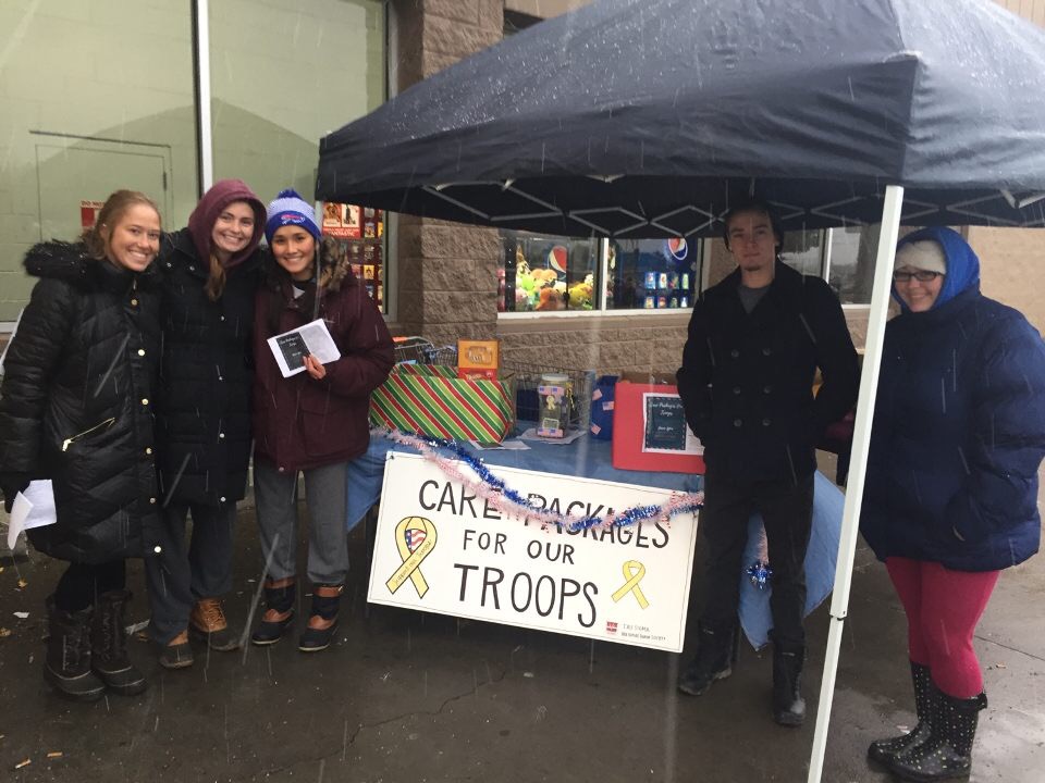 Students under tent at WalMart
