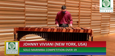 student playing marimba