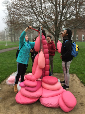 Stockpile sculpture with students