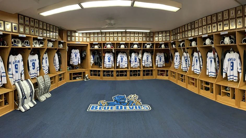 locker room with hockey jerseys