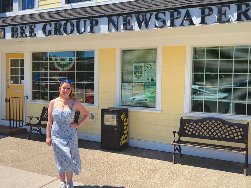 Chloe Kowalyk stands outside Bee Group Newspapers office where she held an internship in Williamsville.
