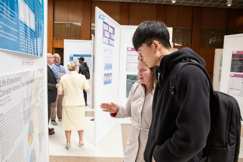 a scene from a research expo on campus for students 
