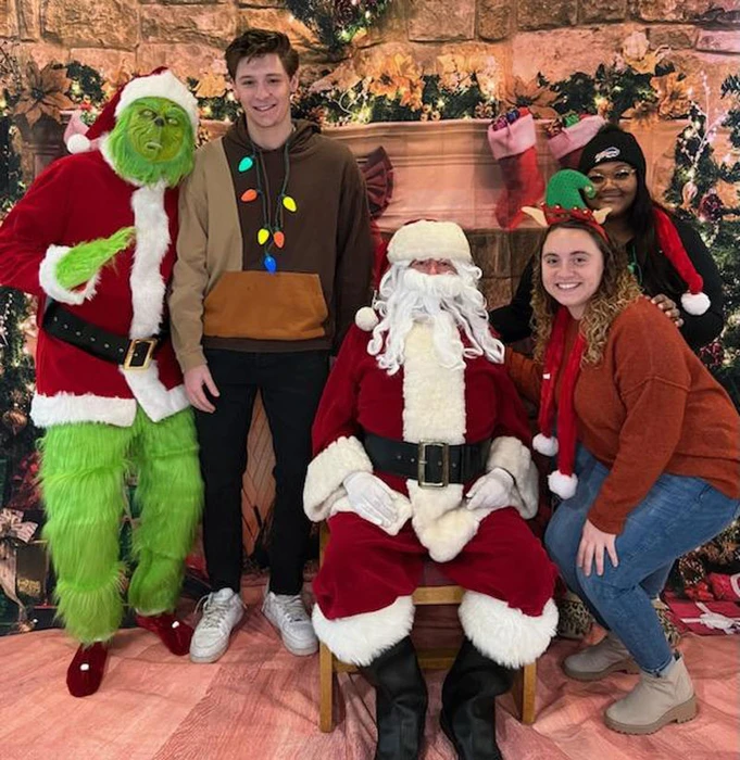 Students with Santa Clause, the Grinch