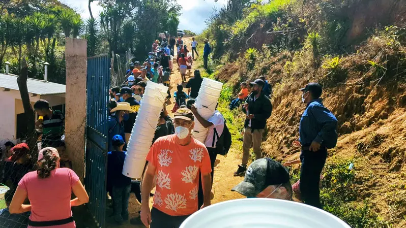 Ted Lee in Honduras water station