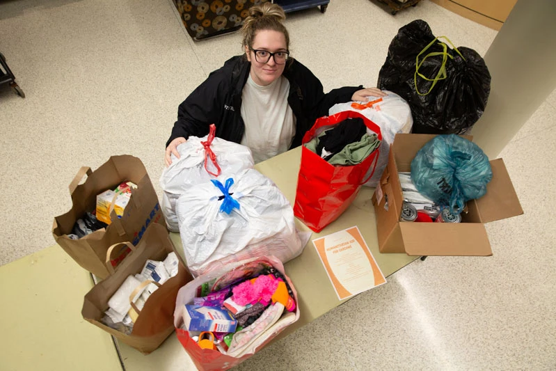Christina Witters with some of the donations