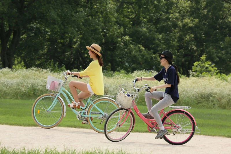 two people bicycling