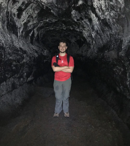 geology student in a cave