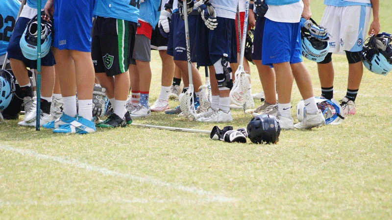 lacrosse players on field