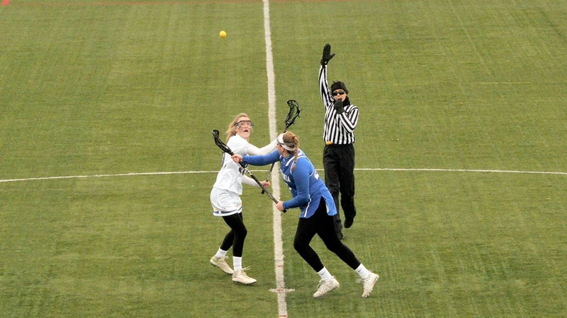 lacrosse players in action