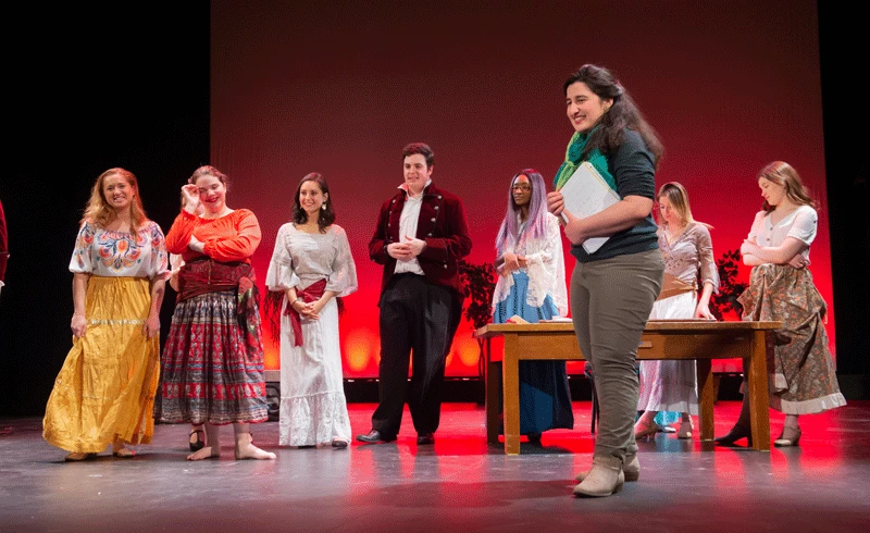 Miriami Bekauri (front right) works with singers working on a scene from "Carmen."