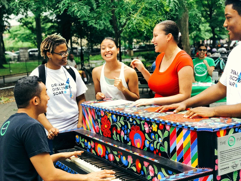 Sing for Hope Piano by artist Jordy Lievers-Eaton placed at Marcus Garvey Park in Harlem.