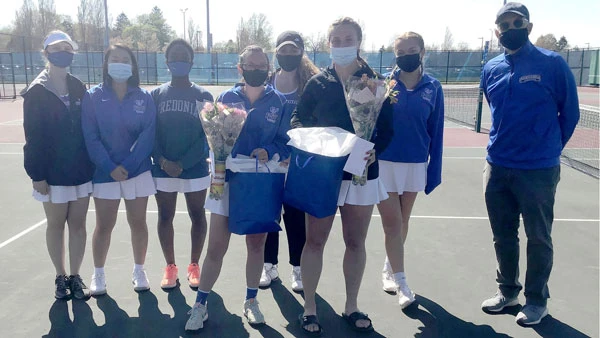 tennis team and seniors with coach