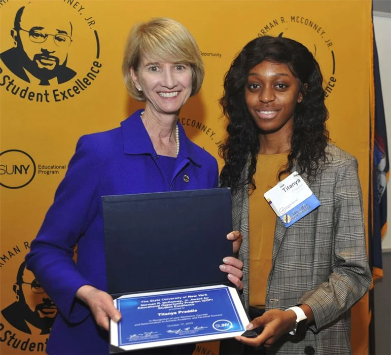 Titanya Preddie, with SUNY Chancellor Kristina M. Johnson