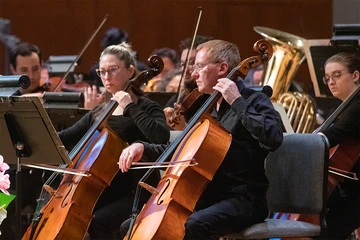 musicians performing on stage