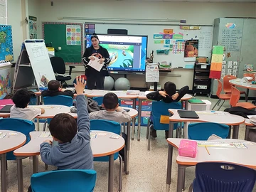 teacher in the classroom with students