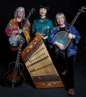 GRAMMY winners Cathy Fink (left) and Marcy Marxer (right), with Chinese musician Chao Tian, will offer a free workshop for School of Music students and the community at the School of Music on Sunday, Nov. 12.