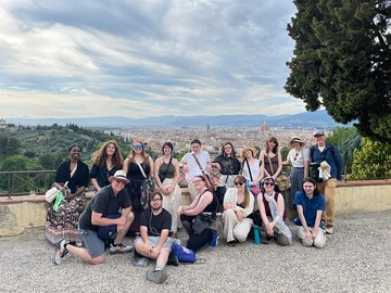 students and faculty in a group overlooking the city of Florence, Italy