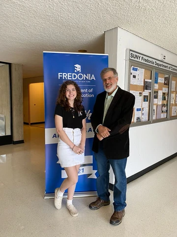 Honors Student of the Month Alyssa Bump with Associate Professor Elmer Ploetz