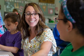 teacher in classroom with students