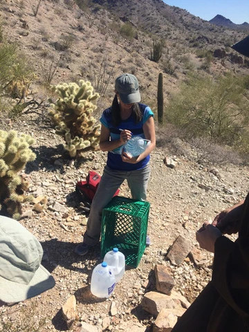 Cheryl Opalski works at a water drop site