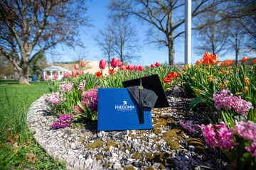 image of mortarboard and diploma